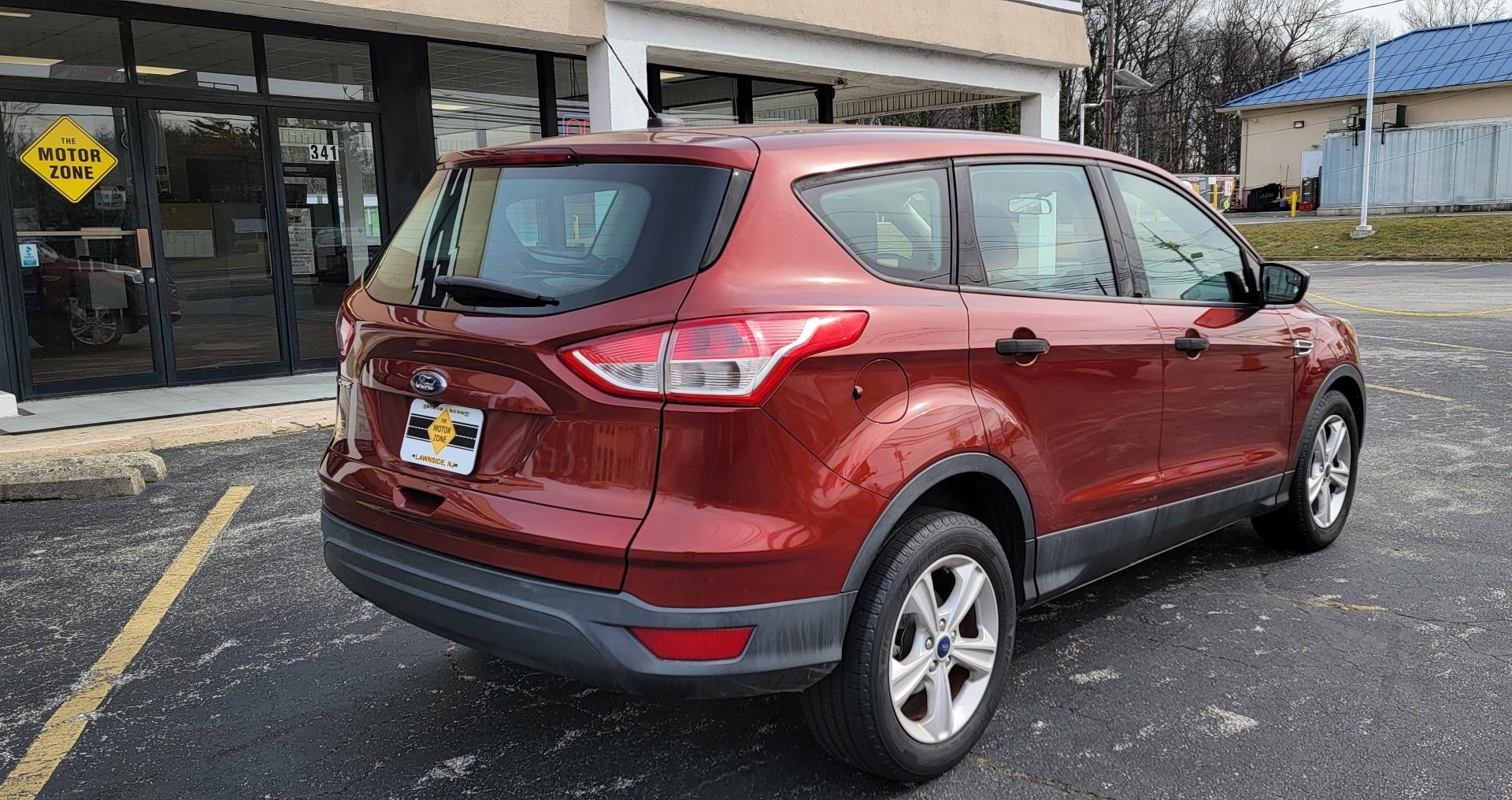 2014 Ruby Red /Black Ford Escape S (1FMCU0F72EU) with an 4-Cyl, 2.5 Liter engine, Automatic transmission, located at 341 N White Horse Pike, Lawnside, NJ, 08045, (856) 262-9500, 39.855621, -75.027451 - Photo#4